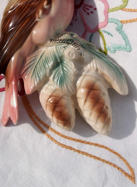 Ceramic Parrot - pine cone detail