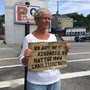 Susan St. Amour panhandles on a median in Portland, Maine. The city tried to ban loitering on medians last year, but a judge found the law unconstitutional.