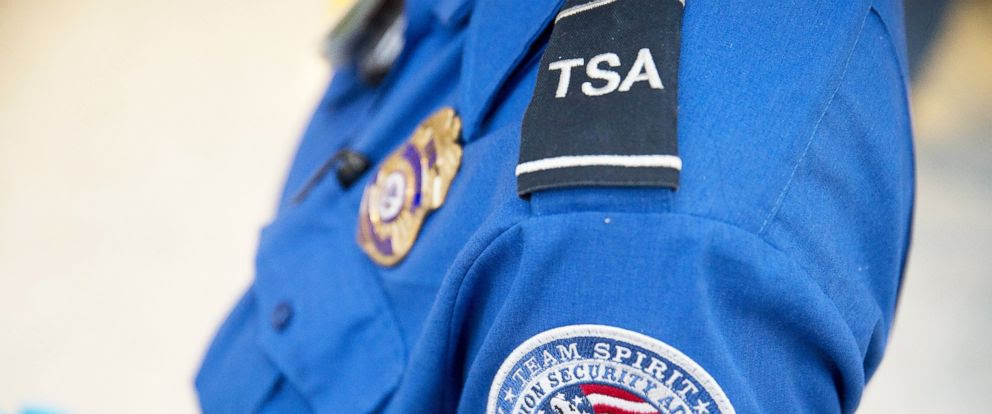 PHOTO: A Transportation Security Administration officer stands in the pre-check area at Dulles International Airport in Dulles, Va., Aug. 19, 2015. 