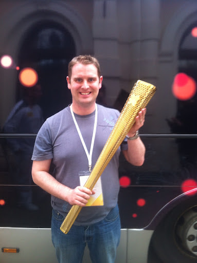 Adrian with an Olympic Torch