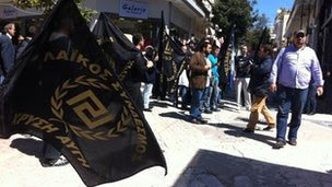 Members of the Golden Dawn party campaigning