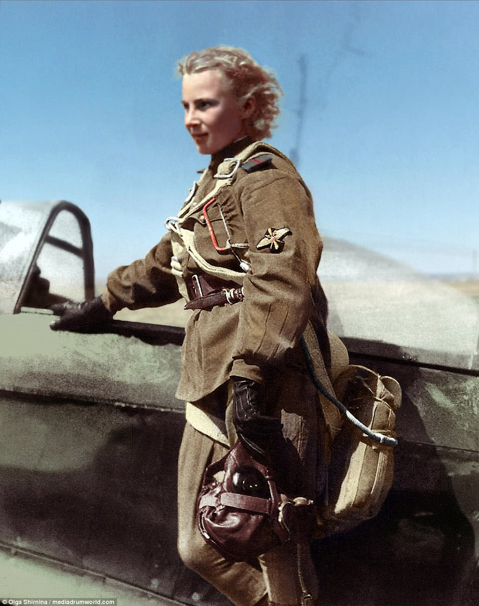 Taking flight: Lydia Litvyak prepares to board her fighter plane during the Second World War. Members of the squadron were dubbed the Night Witches by the Nazis