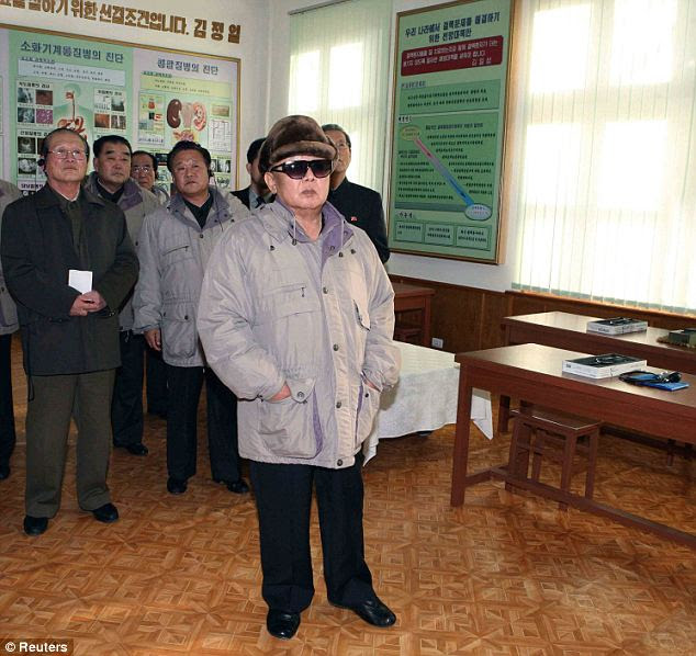 Border tension: North Korean leader Kim Jong-il is pictured at Pyongyang Medical College of Kim Il Sung University in Pyongyang in this picture released by North Korea's official KCNA news agency 
