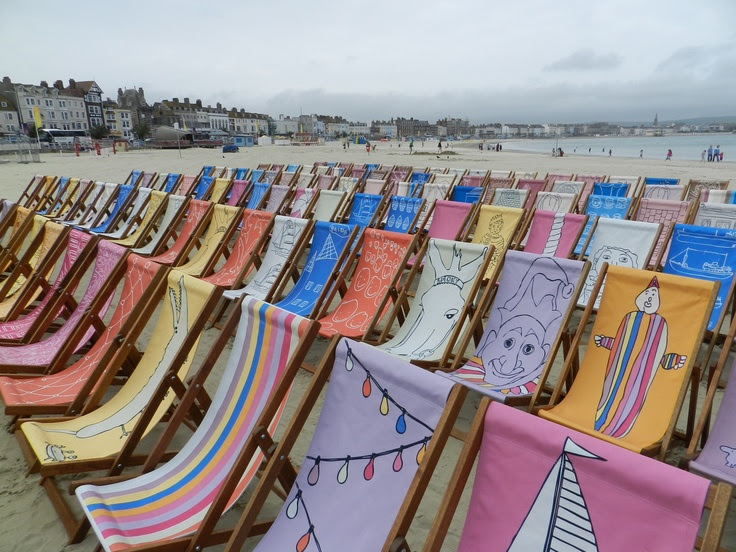 A different view of the deck chairs at the community deck chair project lunch event looking down Weymouth Beach. (c) Reay Scenics 2012.