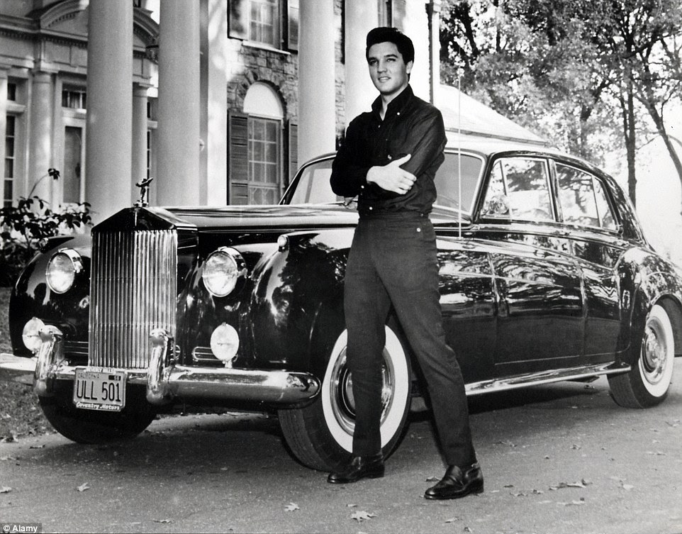 Quick fix: Elvis was renowned for his love of cars, especially Rolls Royces. He is pictured here with another Phantom he bought in 1961 outside his Graceland mansion 