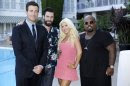 This image released by NBC shows, from left, Carson Daly, Adam Levine, Christina Aguilera, and CeeLo Green at a cocktail reception for "The Voice" in Beverly Hills, Calif., on Saturday, July 27, 2013. (AP Photo/NBC, Paul Drinkwater)