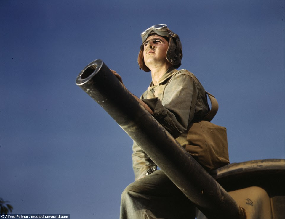 National pride: This M3 tank crewman was one of hundreds of troops photographer by Palmer during his time as official head photographer for the Office of War Information
