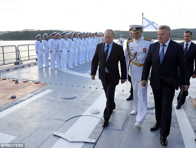 Russian President Vladimir Putin inspects the navy corvette Sovershenny during the Eastern Economic Forum in Vladivostok, Russia, on Wednesday