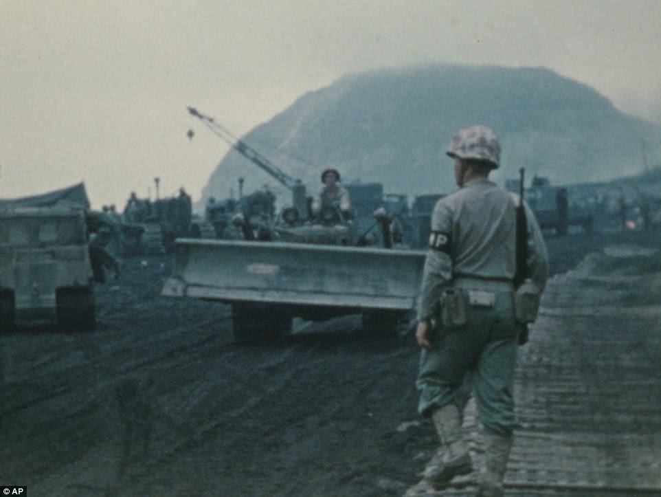 The process of preserving about 2,000 hours of film showing marines in action during the Second World War, Korea and Vietnam (pictured) has begun