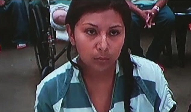 Accused: Karina Torrescano Hernandez (pictured) allegedly burned her young son's hands on a stove as a punishment for touching an iPad