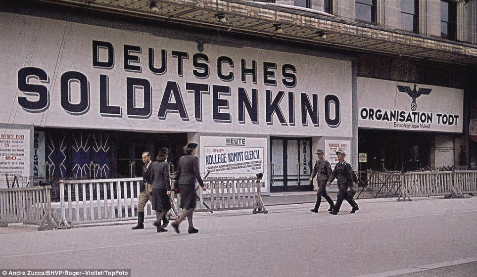 Reminder of occupation: A theatre, which has an Imperial Eagle painted on its wall, proclaims itself as a German soldier's cinema