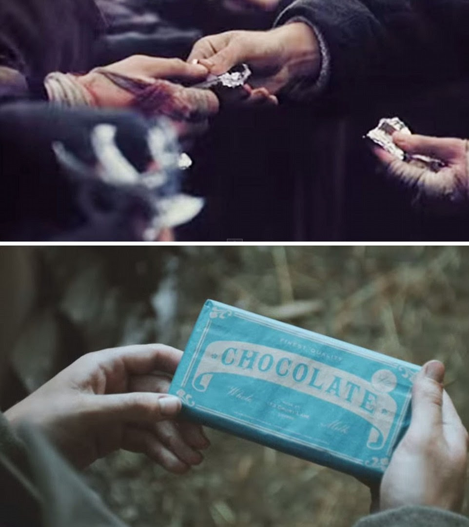 Symbolic: Both videos also showed the exchange of chocolate, which Sainsbury's believe sums up the spirit of Christmas