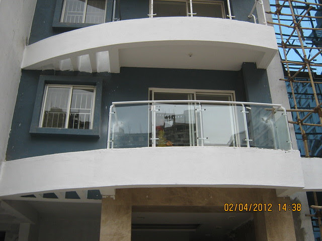Sparklet - Megapolis Smart Homes 1, Hinjewadi Phase 3, Pune 411057 - balcony with glass railings
