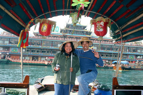posing with the sampan captain, thomas