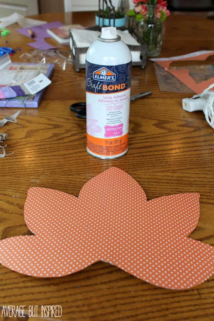 My guest contributor, Bre from Average but Inspired, is sharing a fun upcycle for a dollar store autumn leaf. Find the tutorial at diy beautify! glue the paper to the leaf shape