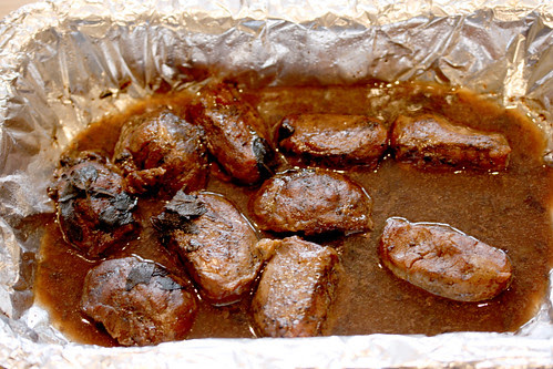 Pig cheeks in tray
