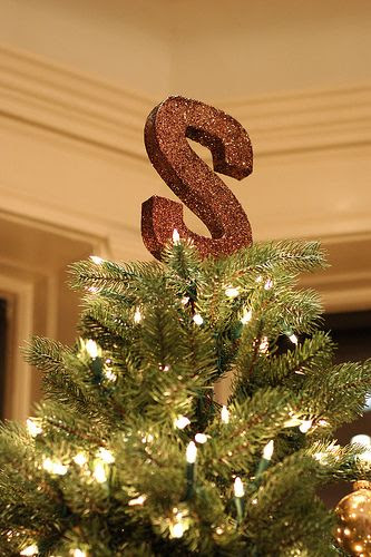 Can mimick this look with the brown paper-covered letters from Hobby Lobbby...and just spray adhesive and sprinkle copper and gold mixed glitter. I would add picks though...lc agrees ....it needs something...some blendng....but then the tree is very simple also.  Lots of possibilites