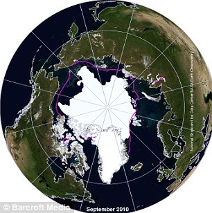2010: A satelite image of the North Pole showing the monthly average ice extent for September 2010. Purple line shows the median ice edge.