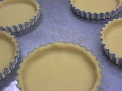 Tart shells filled with shortbread - ready for bakeoff