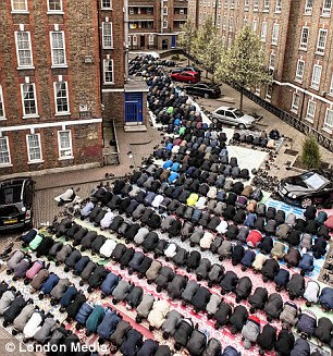 HUNDREDS OF WORSHIPPERS GATHER FOR FRIDAY PRAYERS AT THE BRUNE STREET MOSQUE 