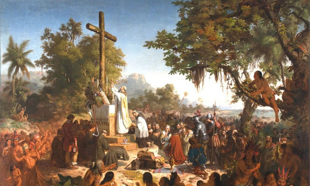 Primeira Missa â Ãleo de Victor Meirelles â Museu Nacional (RJ). Nossa Pátria nasceu à sombra da Cruz, presente no altar em que se celebrou a primeira Missa, cujo oficiante foi o franciscano Frei Henrique de Coimbra.