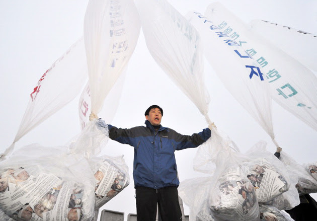 Defector and activist Park Sang-hak with airdrop balloons