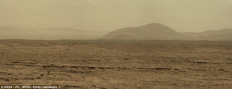 Misty morning: Emily Lakdawalla, a blogger for The Planetary Society, created this mosaic image from three separate images taken by Curiosity nearly two weeks ago
