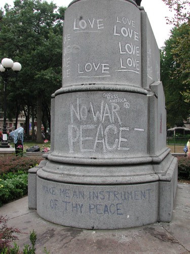Anti-war graffiti on base of statue, Union Square Park, September 24, 2001