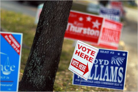 Signs outside an early voting station in Lauderhill, Fla.
