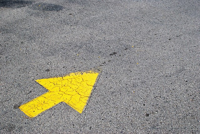 A yellow arrow pointing into the frame.
