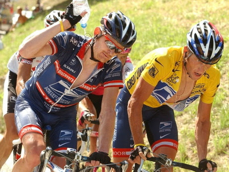 Floyd Landis, left, and then-teammate Lance Armstrong during the 2004 Tour de France.