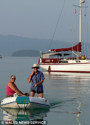 Jane and Clive Green took a dinghy to shore in Malaysia during their round the world sailing trip, which took over 16 years to complete