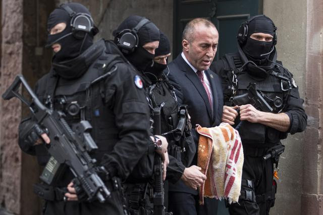 Haradinaj (2nd R) on Jan. 12 leaves the court escorted by police officers in Colmar, France (Tanjug/AP)