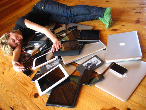 Cuddling with multiple devices by adactio, on Flickr