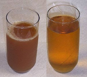 American-style apple cider, left; Apple juice,...
