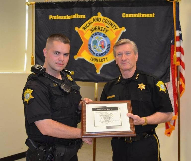 Senior Deputy Derek Fish, left, fatally shot himself in his patrol car while on duty Friday. He was recognized with the Sheriff’s Department’s “Deputy of the Quarter” award in April.