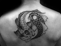 Black And White Yin Yang Koi Fish Tattoo