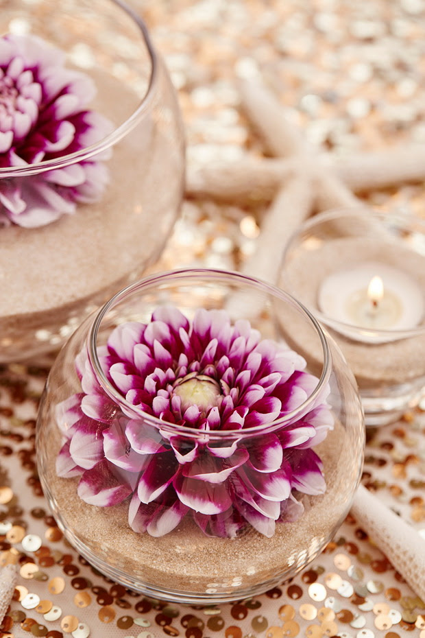 DIY sand and flower wedding centerpieces for beach themed wedding