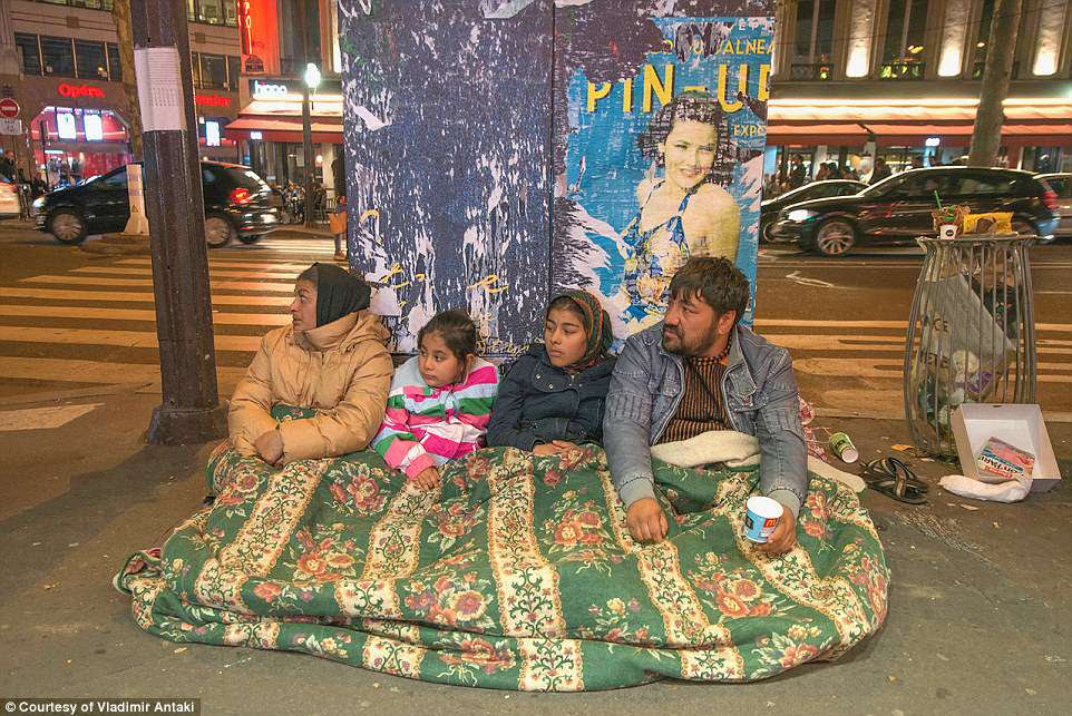 A heart-wrenching photography series captures the plight of refugees in Paris, with whole families living in the streets