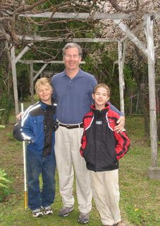 Mike and his sons in the garden at his grandfathers house