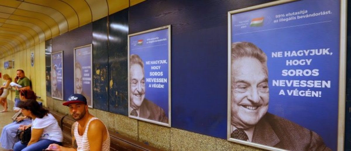 Hungarian government poster portraying financier George Soros and saying "Don't let George Soros have the last laugh" is seen at an underground stop in Budapest, Hungary July 11, 2017. REUTERS/Laszlo Balogh