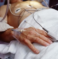 Photo: Man's hand with intravenous tube