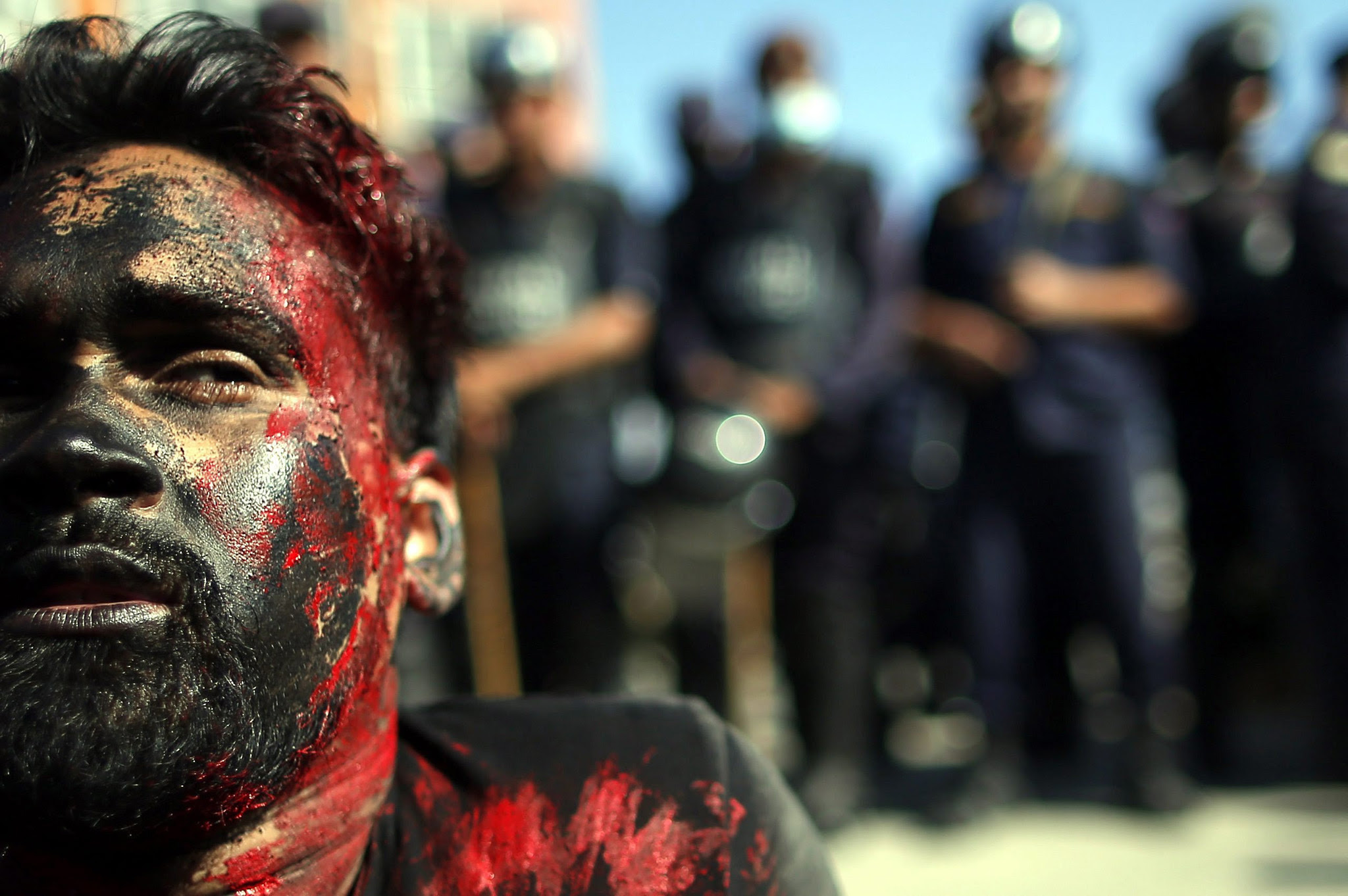 Artist belonging to Nepalese ethnic-based Madhesh political parties acts as an injured activist while protesting to mark the Nepal's first constitution day in Kathmandu, Nepal, 19 September 2016. Hundreds of members of Ethnic Madhesi political parties and related artists protest against the new constitution, which is celebrating by the government side on 19 September 2016. Madhesh based political parties say that this new constitution will not represent their demands which obstructs more political representation for ethnic minorities in the nation's parliament.  EPA/NARENDRA SHRESTHA