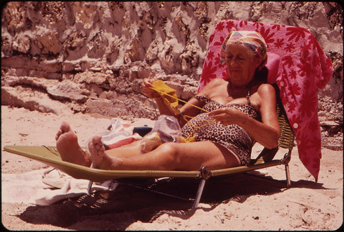 A Member of the South Beach Retirement Community Enjoys the Sun and Sea Air. Most of the Retirees in the Area Live in Inexpensive Residential Hotels Within Walking Distance of the Public Beach.