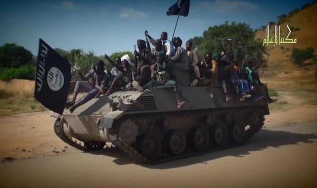A screengrab taken on November 9, 2014 from a new Boko Haram video released by the Nigerian Islamist extremist group Boko Haram and obtained by AFP shows Bok...
