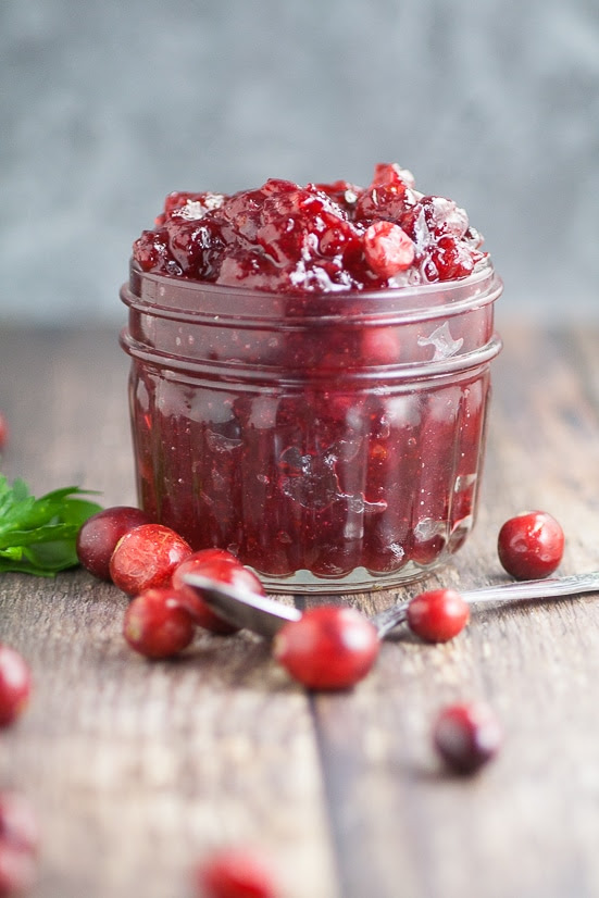  Easy Homemade Cranberry Sauce recipe with apple juice and a hint of maple - A simple, sweet and tangy version of a classic, this 4 ingredient Easy Homemade Cranberry Sauce recipe promises to be a pretty and delicious addition to your Thanksgiving feast!