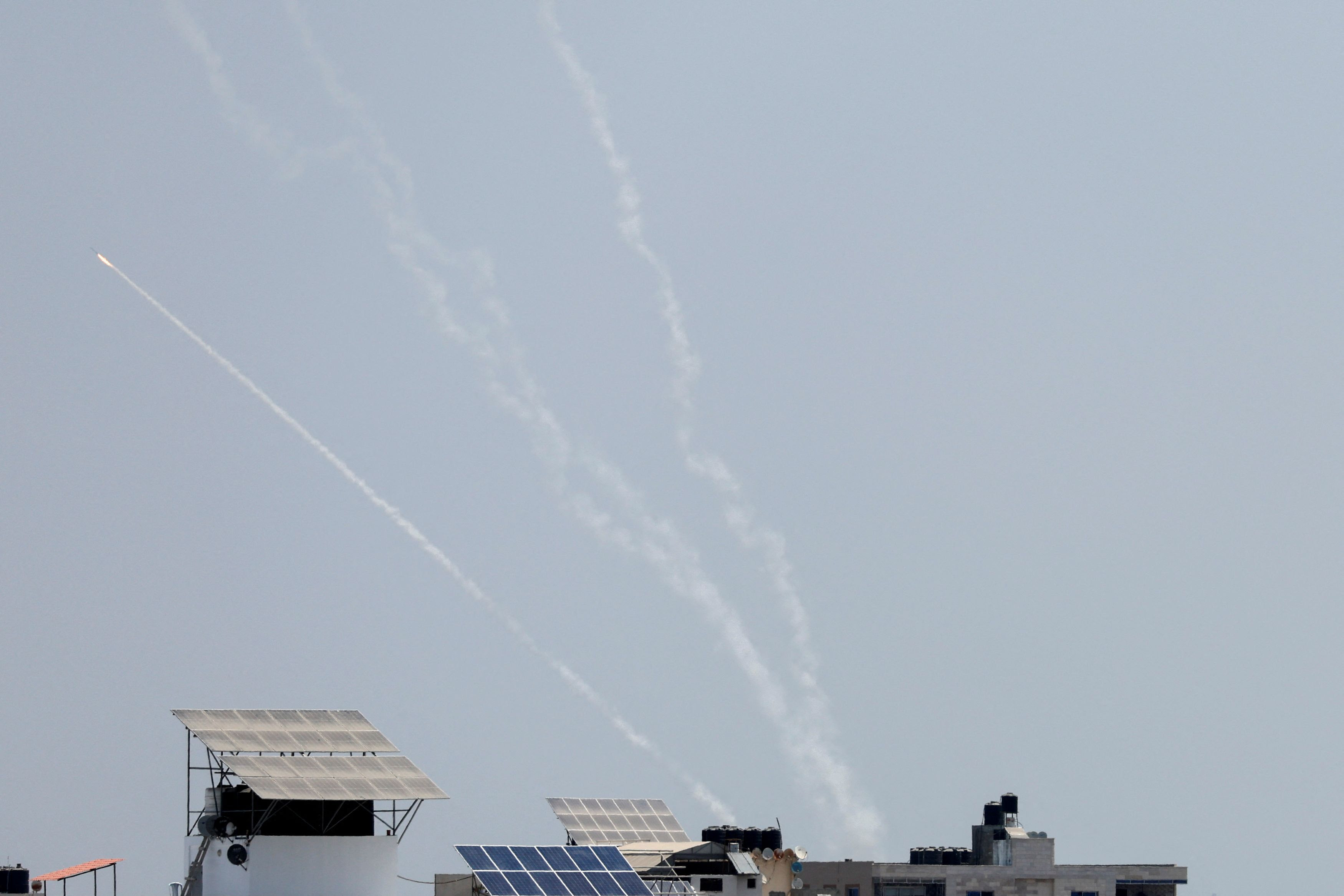 Gaza militants fire rockets at Israel after air strikes kill 12