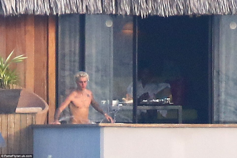 Justin Bieber goes full-frontal NAKED as he enjoys a skinny dipping session...