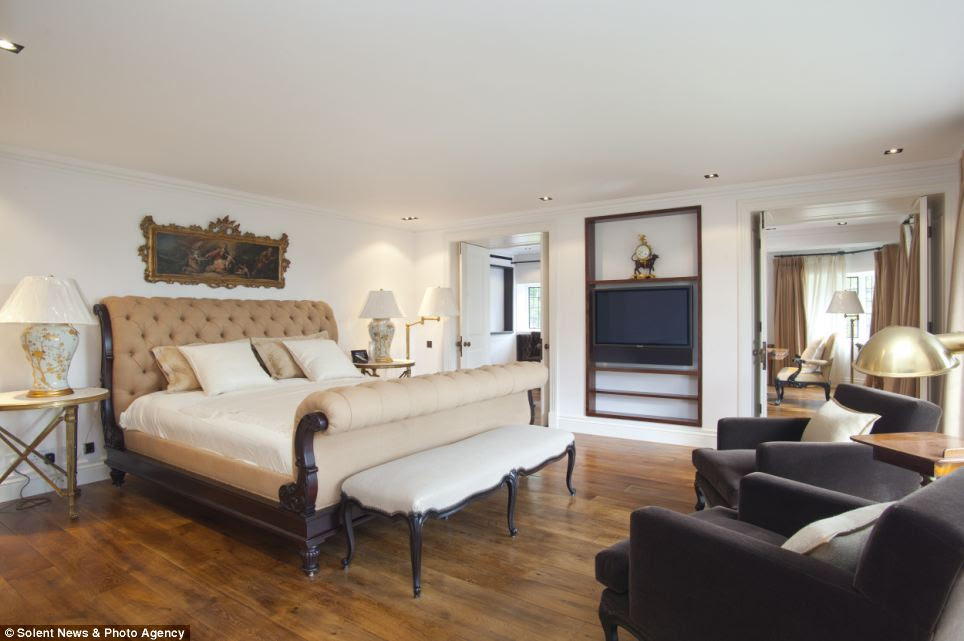 Resting place: One of the six bedrooms in the house, which is now on the market for nearly £14million