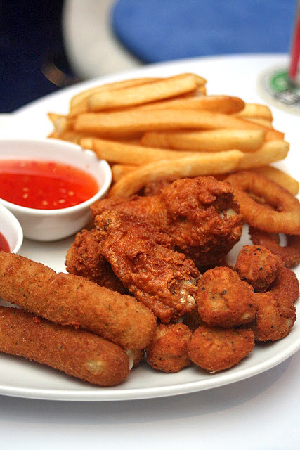 Mixed Platter: Cheese sticks, chicken wings, onion rings and fries